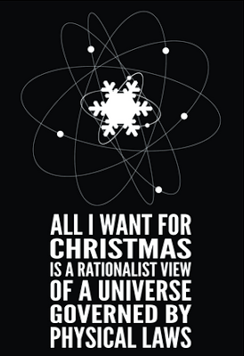 An atom symbol with a snowflake in the centre: card says All I want fo Christmas is a rationalist view of a Universe governed by physical laws"